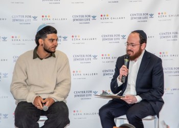 Former Hostage Yosef Chaim Ohana and Rabbi Berel Lerman.