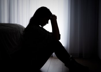 Woman suffering from depression. Sadness and headache concept
