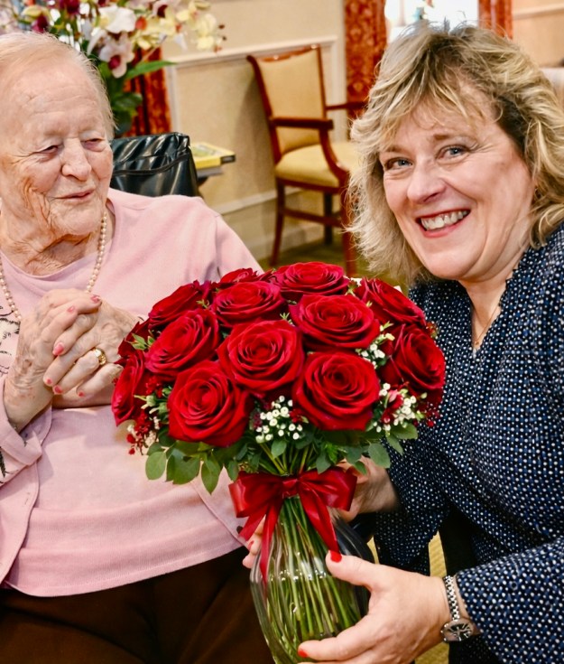 A resident at one the Carmelite System homes with a family member.