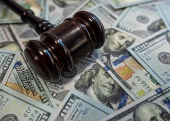 A Sag Harbor woman has been charged with grand larceny for allegedly stealing more than $10,000 from the Sag Harbor Elementary School Parent Teacher Association.