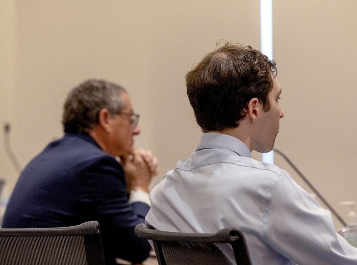 Attorney Richard Novak and defendant Tyler Robinson attend a hearing for Robinson, accused in the fatal shooting of conservative activist Charlie Kirk, in 4th District Court in Provo, Utah, U.S., March 13, 2026.  Laura Seitz/Pool via REUTERS
